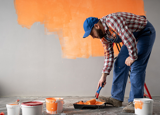 Painter remodeling a room.