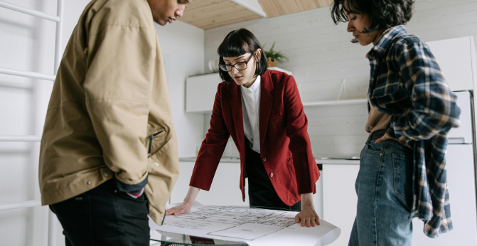 couple going over floor plans